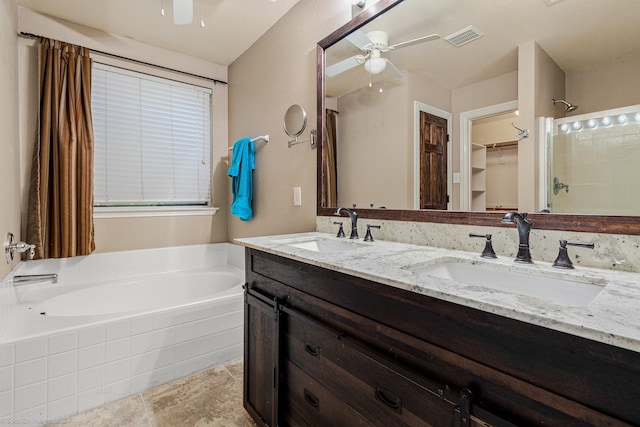 118 Lightning Trl, Forney, TX 75126 - bathroom featuring a ceiling fan, a garden tub, a spacious closet, a shower, and double vanity