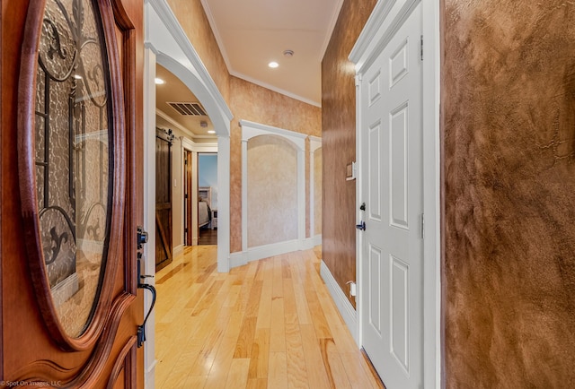 118 Lightning Trl, Forney, TX 75126 - hall with ornamental molding, arched walkways, light wood-style flooring, baseboards, and recessed lighting