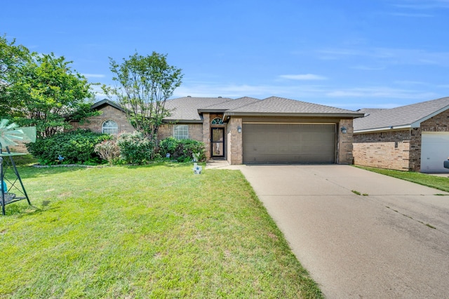 single story home featuring an attached garage, a front lawn, driveway, brick siding, and a shingled roof