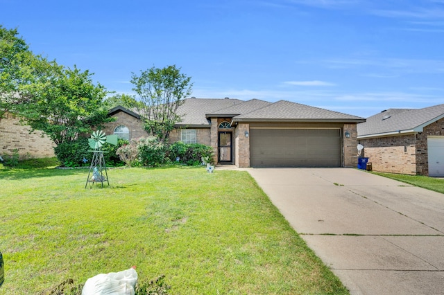 ranch-style home featuring an attached garage, a front yard, driveway, and brick siding