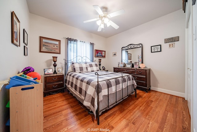 1302 County Road 142, Ovalo, TX 79541 - bedroom featuring light wood-style floors, baseboards, and ceiling fan