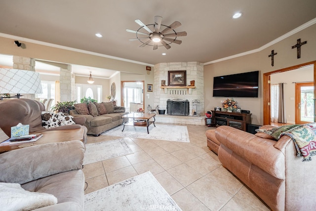 1302 County Road 142, Ovalo, TX 79541 - living room featuring ceiling fan, light tile patterned floors, ornate columns, healthy amount of natural light, and crown molding