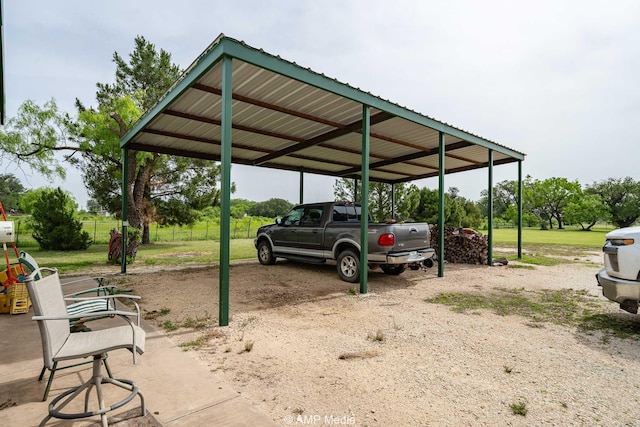 1302 County Road 142, Ovalo, TX 79541 - view of car parking featuring a carport