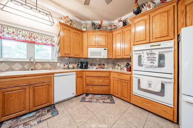 1302 County Road 142, Ovalo, TX 79541 - kitchen featuring white appliances, a sink, light countertops, ornamental molding, and tasteful backsplash