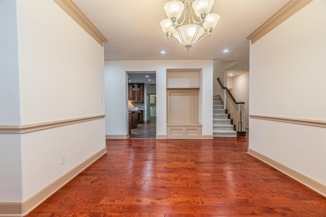15097 Blakehill Dr, Frisco, TX 75035 - unfurnished room with a chandelier, wood finished floors, stairway, baseboards, and recessed lighting
