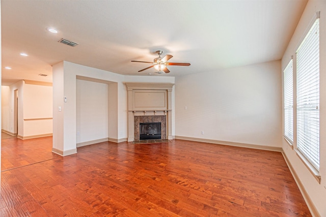 15097 Blakehill Dr, Frisco, TX 75035 - unfurnished living room with ceiling fan, wood finished floors, a premium fireplace, baseboards, and recessed lighting