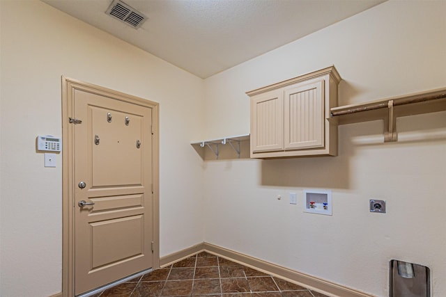 15097 Blakehill Dr, Frisco, TX 75035 - laundry room featuring baseboards, electric dryer hookup, hookup for a washing machine, hookup for a gas dryer, and cabinet space