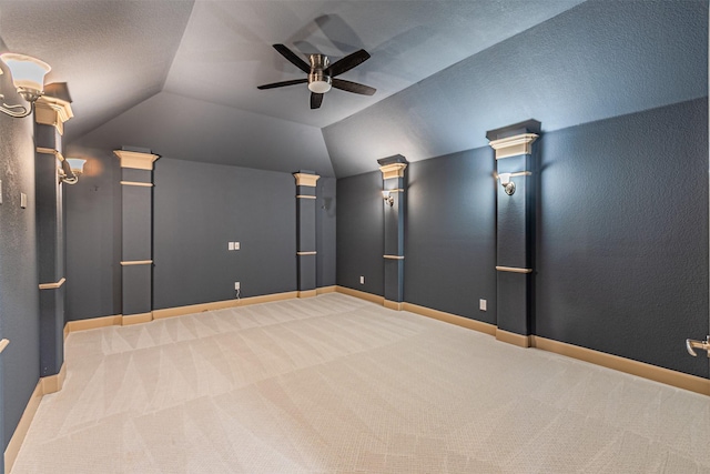 15097 Blakehill Dr, Frisco, TX 75035 - home theater room with a ceiling fan, carpet flooring, lofted ceiling, and baseboards
