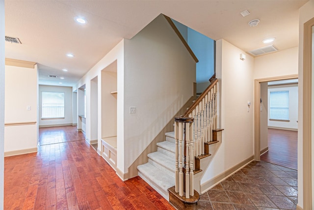15097 Blakehill Dr, Frisco, TX 75035 - stairway featuring baseboards, wood finished floors, and recessed lighting