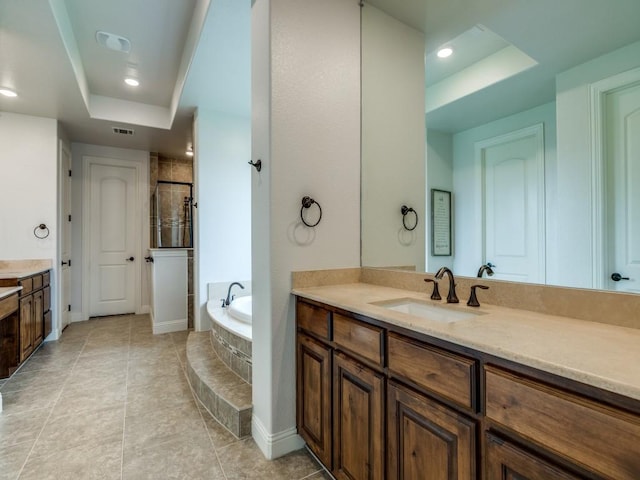 1141 Saint Peter Ln, Prosper, TX 75078 - full bath with a raised ceiling, vanity, a garden tub, a stall shower, and recessed lighting