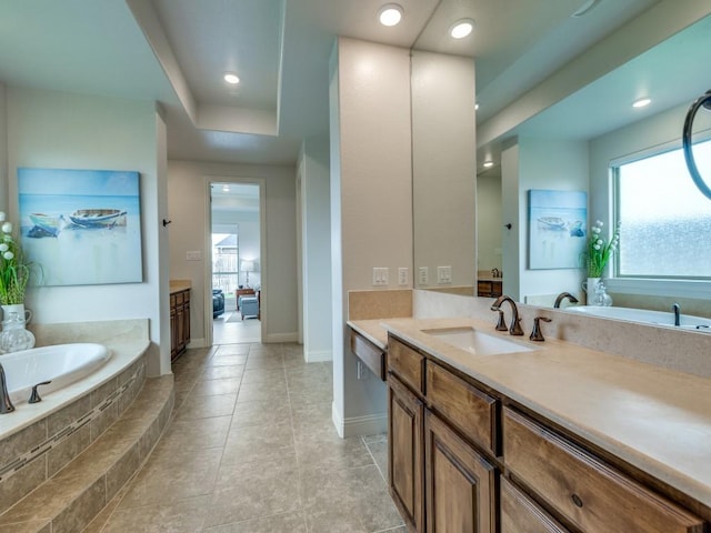 1141 Saint Peter Ln, Prosper, TX 75078 - bathroom with vanity, a bath, tile patterned flooring, and recessed lighting