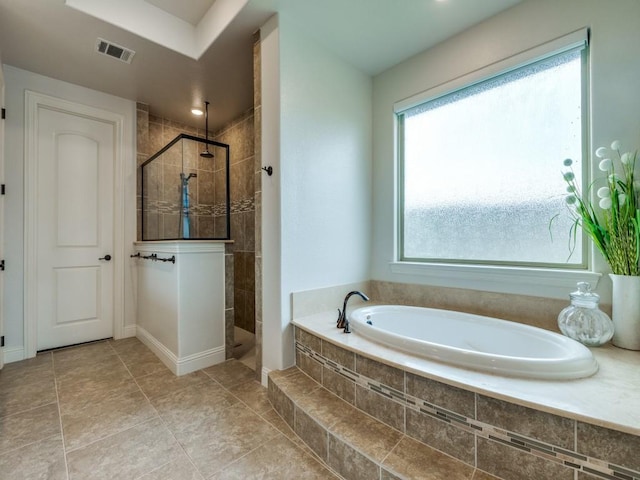 1141 Saint Peter Ln, Prosper, TX 75078 - bathroom featuring a bath and a walk in shower