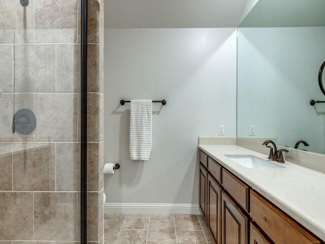 1141 Saint Peter Ln, Prosper, TX 75078 - bathroom featuring vanity and a tile shower