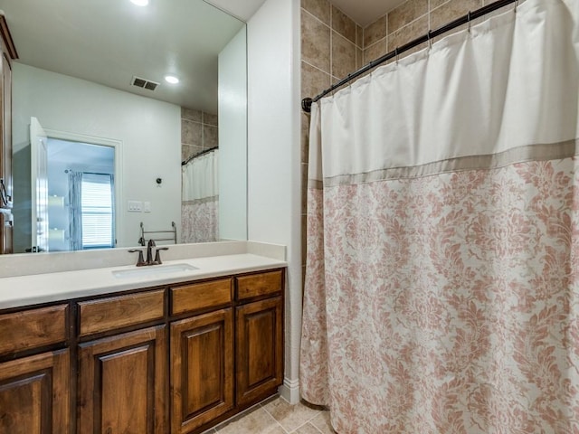 1141 Saint Peter Ln, Prosper, TX 75078 - full bath with vanity, a shower with curtain, tile patterned floors, and recessed lighting