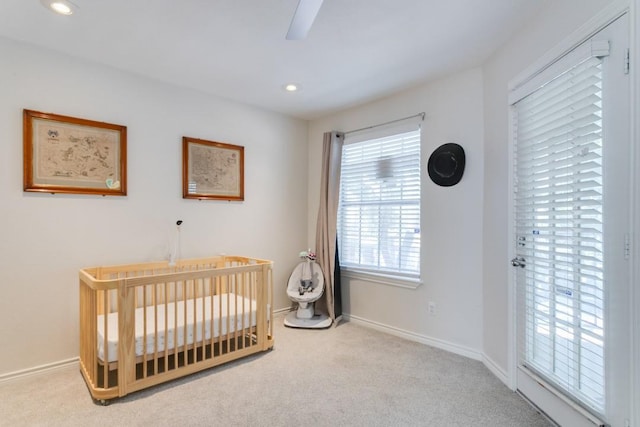 3100 Cole Ave Unit 203, Dallas, TX 75204 - bedroom featuring carpet floors, baseboards, recessed lighting, and a ceiling fan