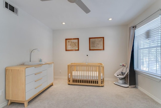 3100 Cole Ave Unit 203, Dallas, TX 75204 - bedroom featuring light carpet, recessed lighting, baseboards, and ceiling fan