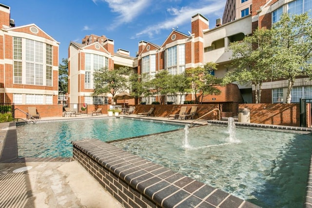3100 Cole Ave Unit 203, Dallas, TX 75204 - community pool with a residential view and fence