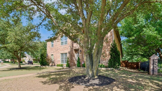 6000 Windridge Ln, Flower Mound, TX 75028 - view of front of property featuring fence and brick siding