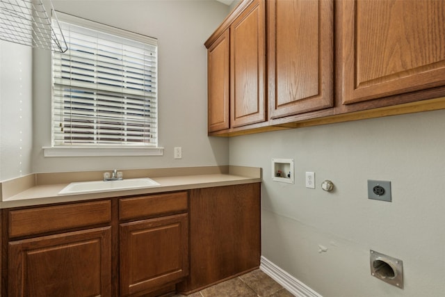 1968 Crowbridge Dr, Frisco, TX 75033 - washroom featuring hookup for an electric dryer, cabinet space, hookup for a gas dryer, baseboards, and plenty of natural light
