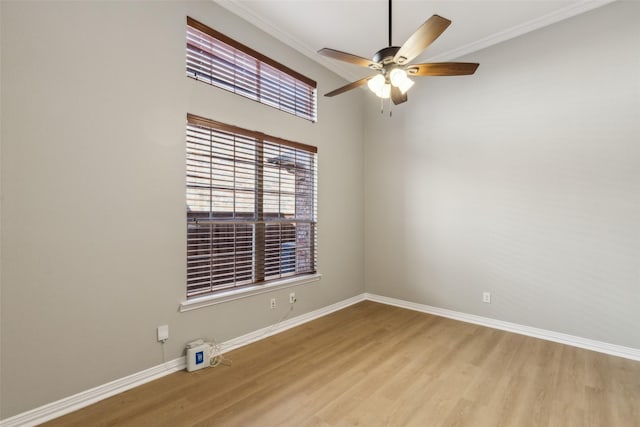 1968 Crowbridge Dr, Frisco, TX 75033 - empty room with a ceiling fan, wood finished floors, baseboards, and crown molding
