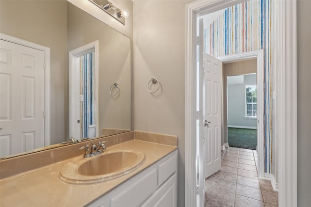 1968 Crowbridge Dr, Frisco, TX 75033 - bathroom with tile patterned flooring, vanity, and baseboards