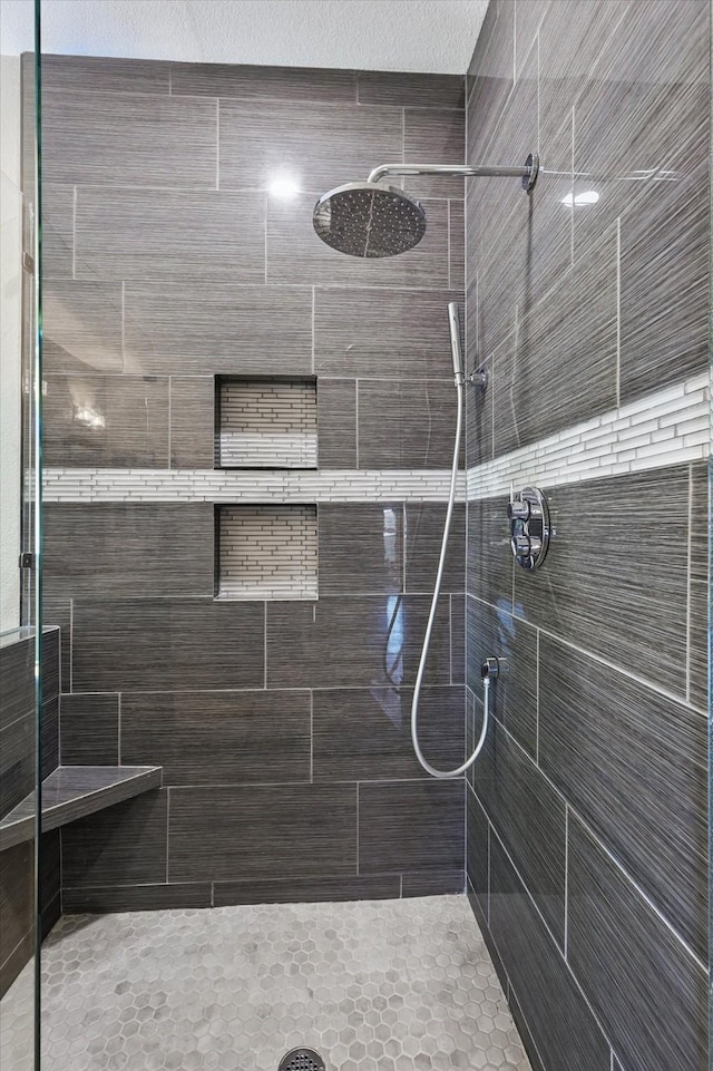 6600 Stewart Blvd, The Colony, TX 75056 - full bathroom featuring a tile shower