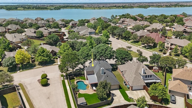 6600 Stewart Blvd, The Colony, TX 75056 - aerial perspective of suburban area with a nearby body of water and a pool area