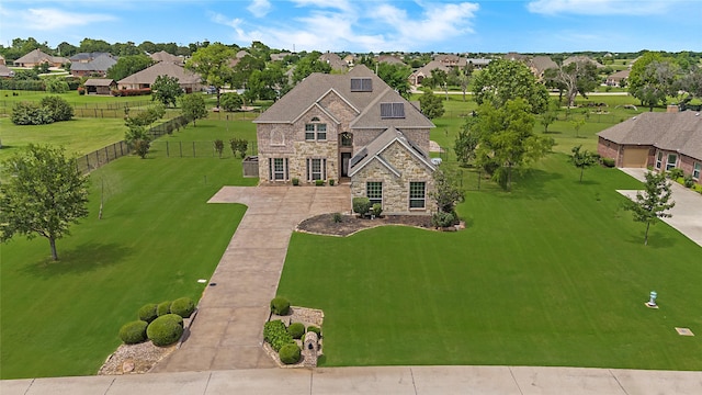 188 Las Colinas Trl, Cross Roads, TX 76227 - view of front of property with stone siding, a residential view, and roof mounted solar panels