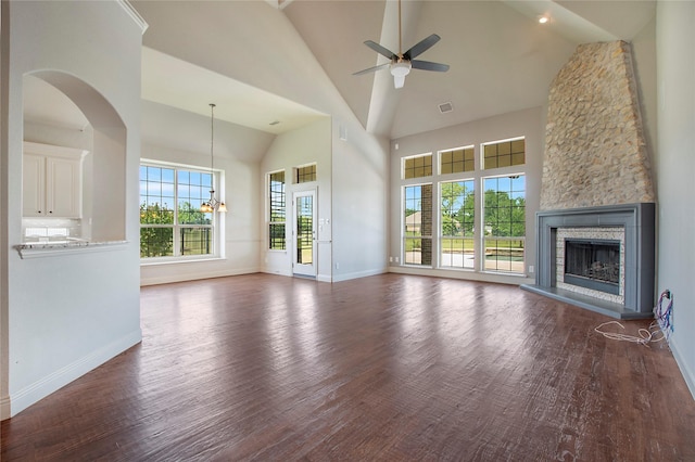 188 Las Colinas Trl, Cross Roads, TX 76227 - unfurnished living room with a ceiling fan, dark wood-style flooring, baseboards, high vaulted ceiling, and recessed lighting