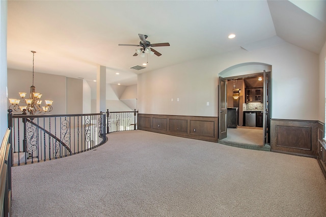 188 Las Colinas Trl, Cross Roads, TX 76227 - spare room with a ceiling fan, carpet flooring, a chandelier, a wainscoted wall, and lofted ceiling
