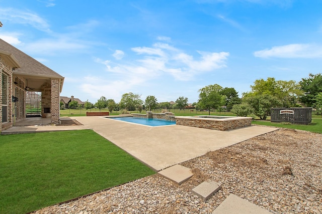 188 Las Colinas Trl, Cross Roads, TX 76227 - view of pool with a patio area, a lawn, and a pool with connected hot tub
