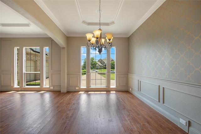 188 Las Colinas Trl, Cross Roads, TX 76227 - unfurnished dining area with wood finished floors, a decorative wall, a chandelier, ornamental molding, and a wainscoted wall