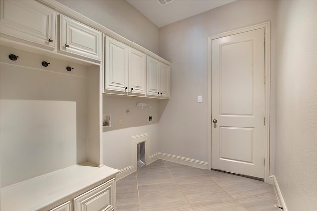 188 Las Colinas Trl, Cross Roads, TX 76227 - laundry room featuring cabinet space, hookup for an electric dryer, baseboards, hookup for a washing machine, and gas dryer hookup