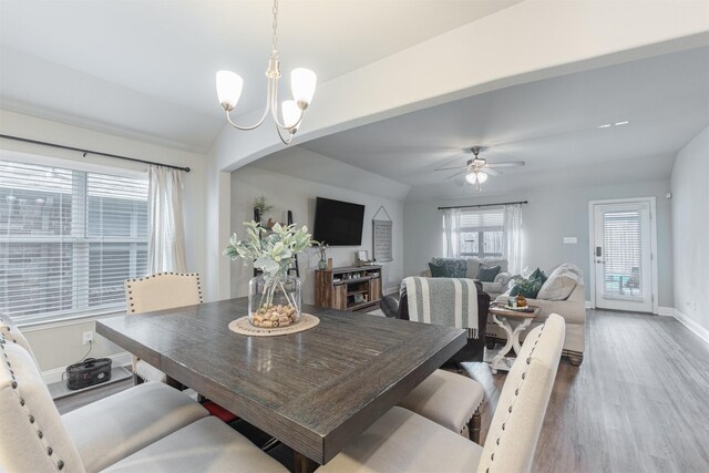 816 Kinghaven Dr, Little Elm, TX 75068 - dining space featuring wood finished floors, baseboards, a chandelier, and a ceiling fan