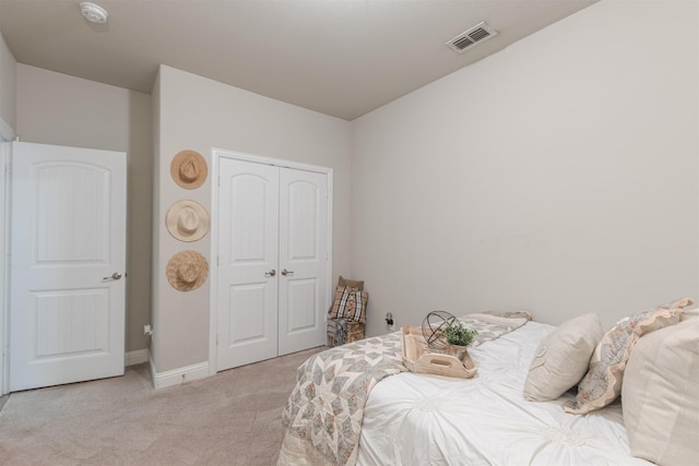 816 Kinghaven Dr, Little Elm, TX 75068 - bedroom featuring light carpet, a closet, and baseboards