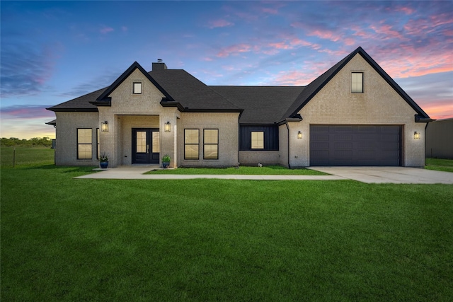 959 County Road 1300, Bridgeport, TX 76426 - french country home featuring french doors, a chimney, a front yard, brick siding, and driveway