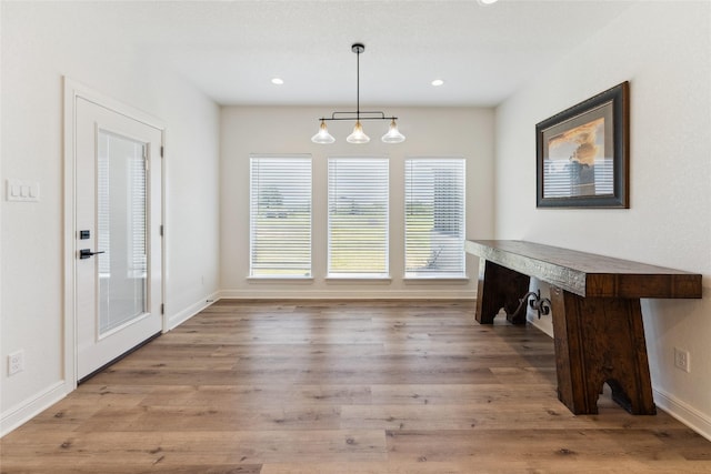 959 County Road 1300, Bridgeport, TX 76426 - unfurnished dining area featuring wood finished floors, baseboards, and recessed lighting