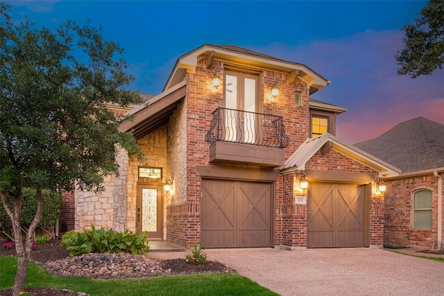2132 Portwood Way, Fort Worth, TX 76179 - view of front facade featuring a balcony, asphalt driveway, brick siding, and a garage