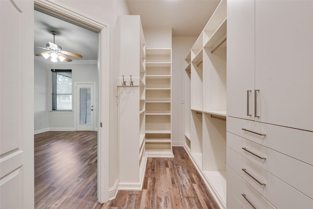 2132 Portwood Way, Fort Worth, TX 76179 - spacious closet with wood finished floors and ceiling fan