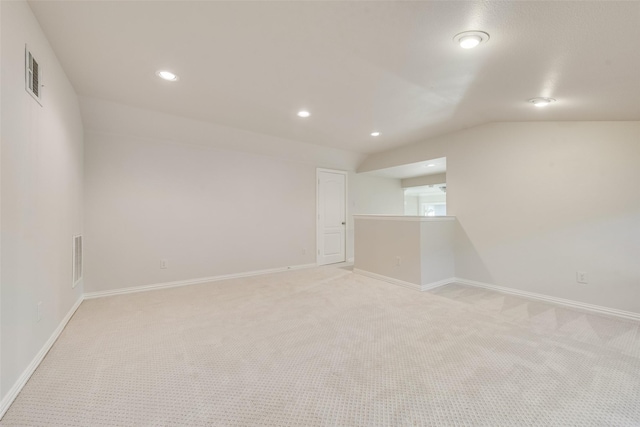 2132 Portwood Way, Fort Worth, TX 76179 - empty room with light colored carpet, baseboards, recessed lighting, and lofted ceiling