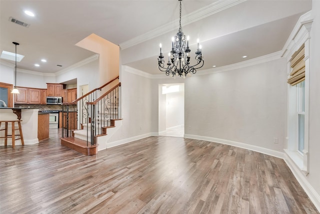 2132 Portwood Way, Fort Worth, TX 76179 - unfurnished living room featuring light wood-style floors, stairway, crown molding, a chandelier, and baseboards