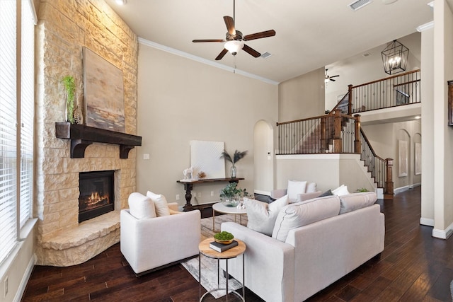 2886 Nottingham Dr, Trophy Club, TX 76262 - living room featuring ceiling fan, stairway, wood-type flooring, crown molding, and a fireplace
