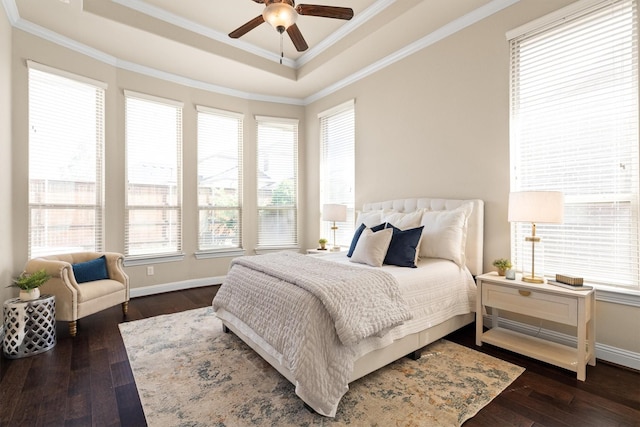 2886 Nottingham Dr, Trophy Club, TX 76262 - bedroom with a tray ceiling, multiple windows, dark wood-type flooring, and ornamental molding