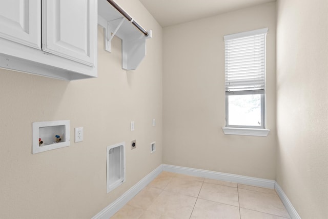2886 Nottingham Dr, Trophy Club, TX 76262 - laundry area featuring cabinet space, hookup for a washing machine, electric dryer hookup, baseboards, and light tile patterned floors