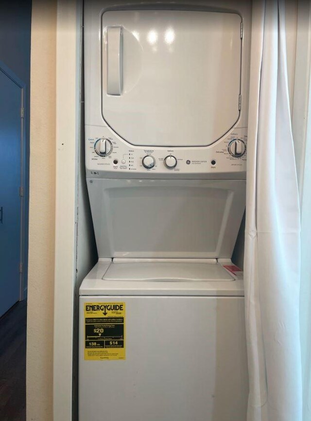 3907 Throckmorton St Unit 4, Dallas, TX 75219 - laundry room with stacked washer and clothes dryer