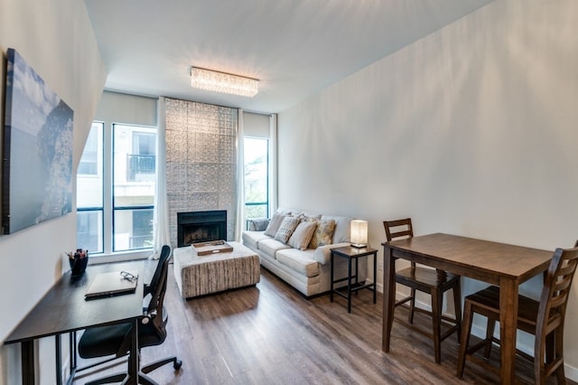 3907 Throckmorton St Unit 4, Dallas, TX 75219 - living area featuring a tile fireplace, wood finished floors, and an office area