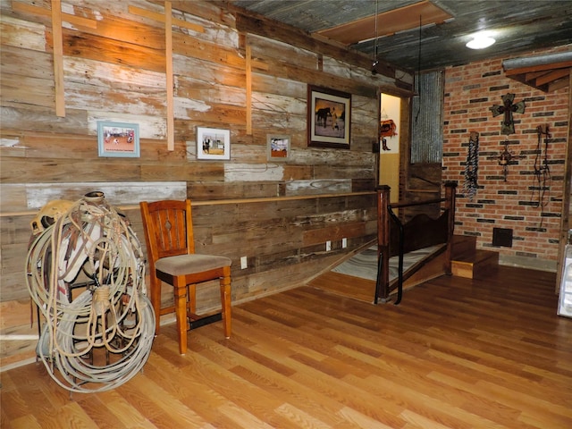 1630 County Road 3239, Hico, TX 76457 - sitting room featuring wood finished floors and wooden walls