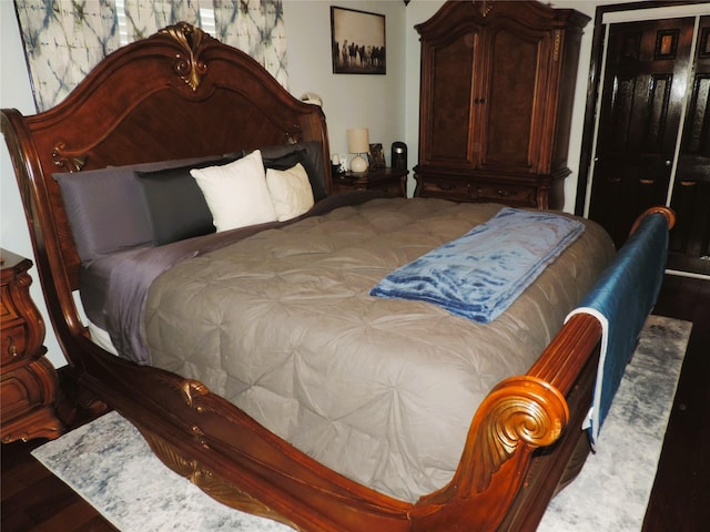 1630 County Road 3239, Hico, TX 76457 - bedroom with wood finished floors and a closet
