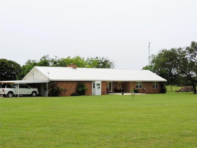 1630 County Road 3239, Hico, TX 76457 - ranch-style house featuring a chimney, a front yard, a carport, and brick siding