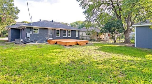 3124 Crest Ridge Dr, Dallas, TX 75228 - back of property with a deck and central air condition unit